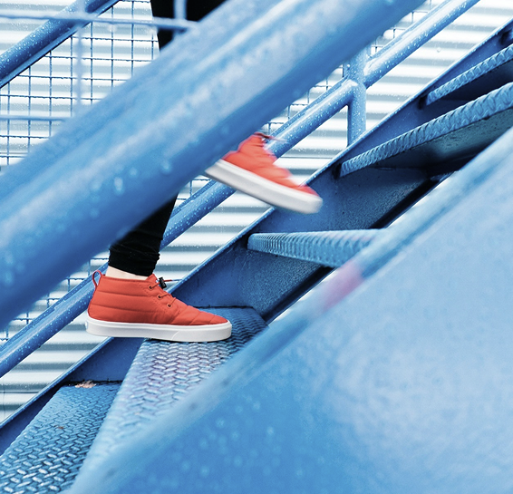 Student walking up stairs